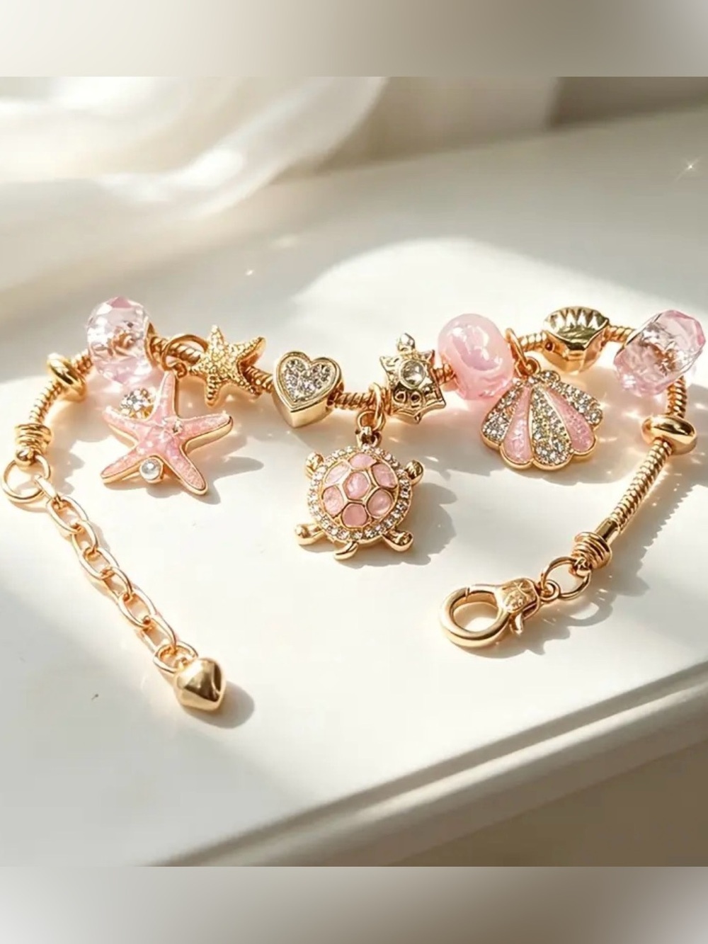 Gold-Tone Pink Sea Charm Bracelet. - Picture 6 of 8